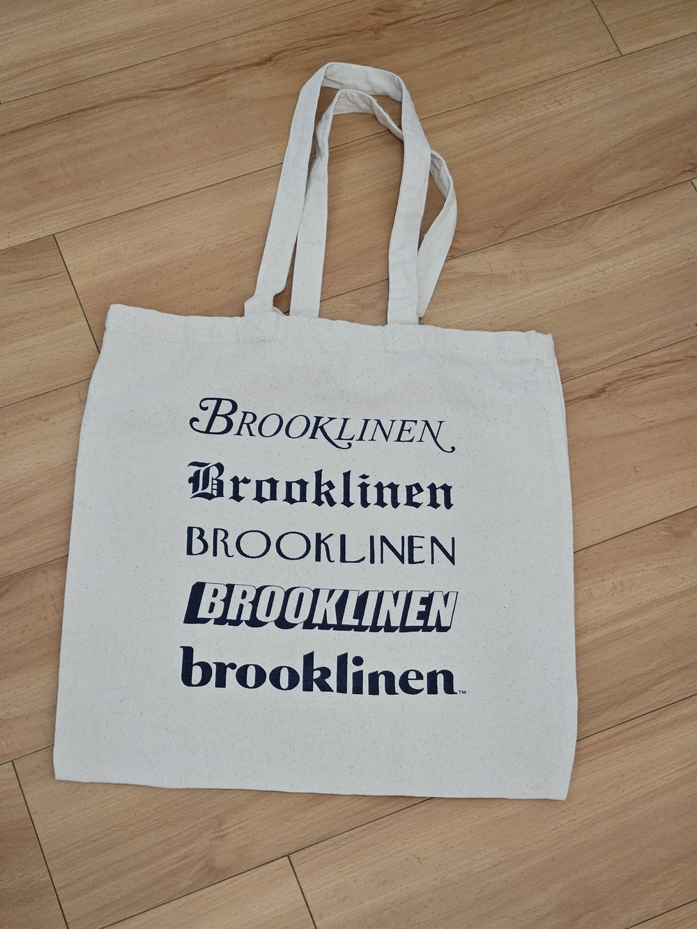 Brooklinen Logo Canvas Tote Bag in Natural with Navy Print